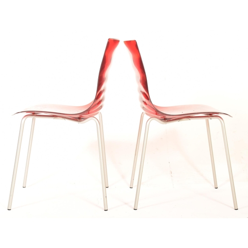 249 - Calligaris - L'Eau Stacking Chairs - a pair of contemporary Italian designer dining chairs. Each cha... 