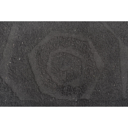 254 - Auckland - a contemporary designer thick pile black carpet rug. The rug of rectangular form with sha... 