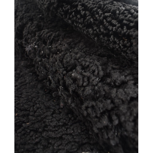 254 - Auckland - a contemporary designer thick pile black carpet rug. The rug of rectangular form with sha... 