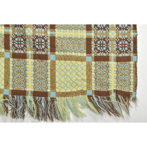 261 - A vintage 20th century hand woollen traditional Welsh blanket. The blanket in hues of cappucino, yel... 