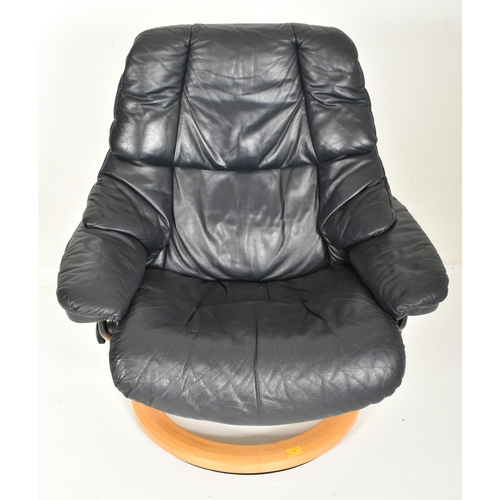 262 - Ekornes - Stressless - a 20th century reclining armchair / easy lounge swivel chair and matching sto... 