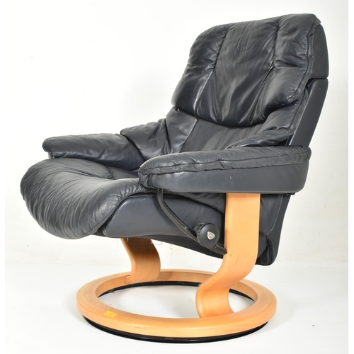 262 - Ekornes - Stressless - a 20th century reclining armchair / easy lounge swivel chair and matching sto... 