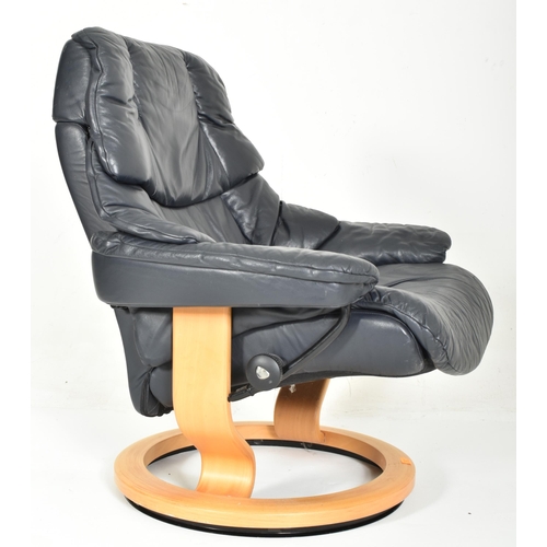 262 - Ekornes - Stressless - a 20th century reclining armchair / easy lounge swivel chair and matching sto... 