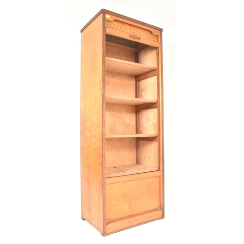 272 - A retro 20th century oak & oak-ply tambour front haberdashery cabinet cupboard. The cabinet havi... 