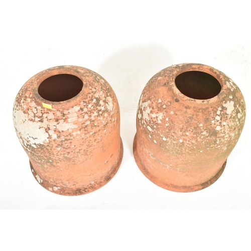 274 - A pair of large 20th century weathered terracotta rhubarb / kale forces. Each with circular mouth an... 