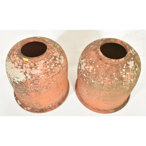 274 - A pair of large 20th century weathered terracotta rhubarb / kale forces. Each with circular mouth an... 