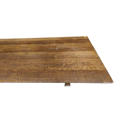 280 - A very large 20th century oak refectory dining table. The table having a large rectangular top raise... 