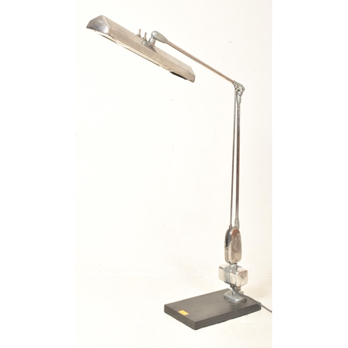 298 - A large retro 20th century chrome articulated machinist industrial re-mounted floor lamp light. The ... 