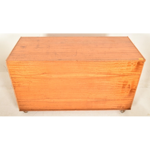 308 - A vintage mid century teak wood rectangular blanket chest / coffer raised on castors. The chest poss... 