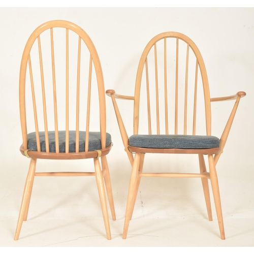 312 - Ercol Furniture - Quaker Range - a set of four beech & elm spindle hoop back dining chairs. Each... 