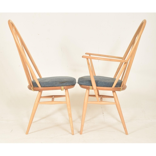 312 - Ercol Furniture - Quaker Range - a set of four beech & elm spindle hoop back dining chairs. Each... 