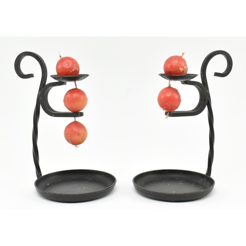 325 - A pair of retro Danish design circa 1970s cast iron ball & chain candlesticks, complete with ori... 