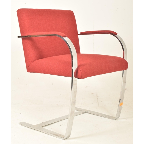 332 - Mies van der Rohe for Knoll Studios - Brno Chair - a retro steel frame red upholstered armchair. The... 