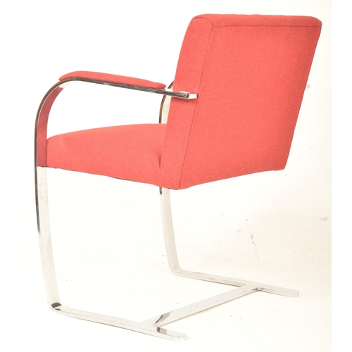 332 - Mies van der Rohe for Knoll Studios - Brno Chair - a retro steel frame red upholstered armchair. The... 