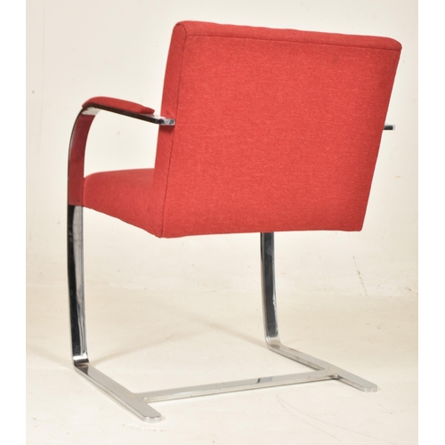 332 - Mies van der Rohe for Knoll Studios - Brno Chair - a retro steel frame red upholstered armchair. The... 