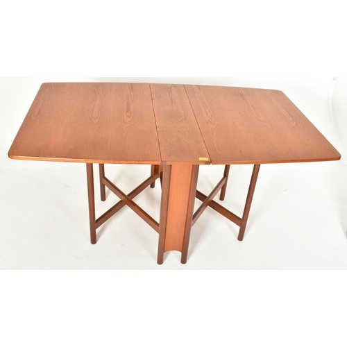 337 - Mackintosh Furniture - a vintage mid century solid teak wood dining table with drop leaf sides. The ... 