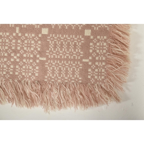 341 - A vintage 20th century hand woollen traditional Welsh blanket. The blanket in hues of cream and capp... 