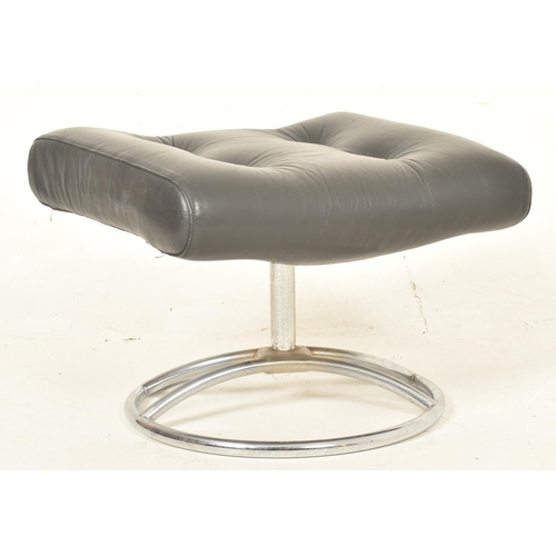 355 - Ekornes - a Swedish Modern Design 20th century 1970s chrome framed and black leather swivel lounge a... 