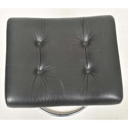 355 - Ekornes - a Swedish Modern Design 20th century 1970s chrome framed and black leather swivel lounge a... 