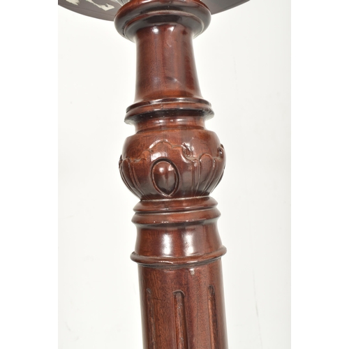 361 - A pair of contemporary high end design carved wood floor torchere column stands. Each jardiniere hav... 