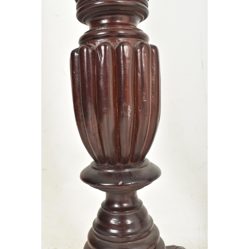 361 - A pair of contemporary high end design carved wood floor torchere column stands. Each jardiniere hav... 