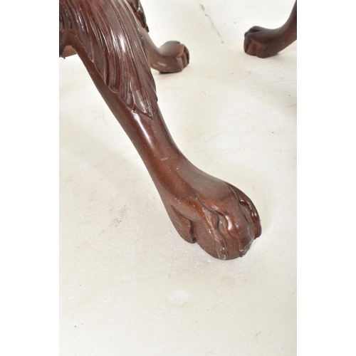 361 - A pair of contemporary high end design carved wood floor torchere column stands. Each jardiniere hav... 