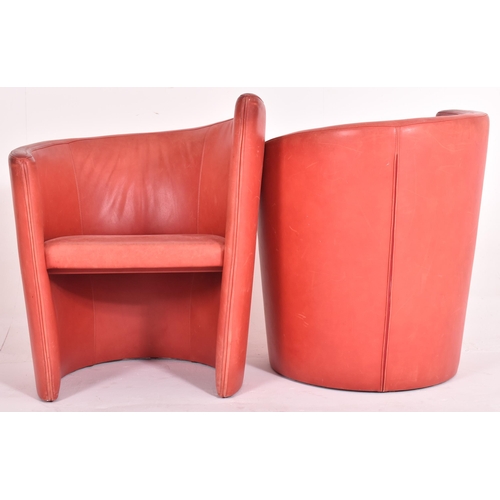 362 - British Modern Design - A pair of retro mid 20th century red leather tub lounge armchairs. Each chai... 