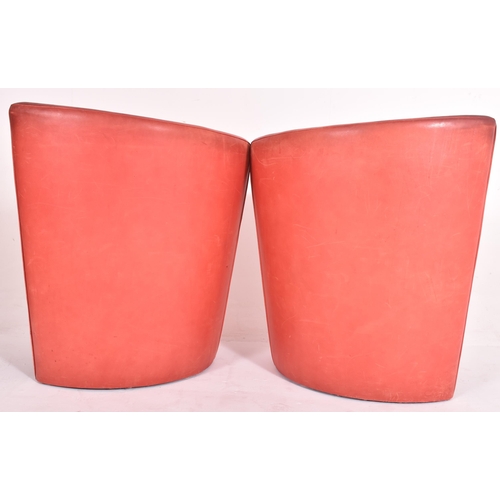 362 - British Modern Design - A pair of retro mid 20th century red leather tub lounge armchairs. Each chai... 