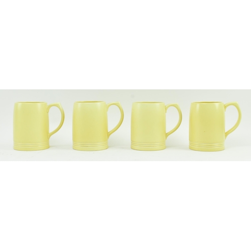 365 - Keith Murray for Wedgwood - a set of nine vintage mid century ceramic beer mugs / steins. Each mug i... 