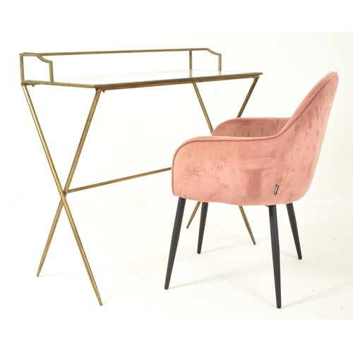 372 - A contemporary designer glass and brass framed desk and chair. The desk having a glass top with a br... 