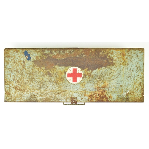 373 - A vintage 20th century military / medical First Aid kit tin box. Elongated form having a hinged lid ... 