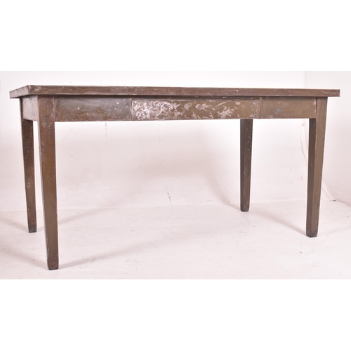 382 - A retro mid century industrial metal workman's table / desk. The table having a metal top and legs f... 