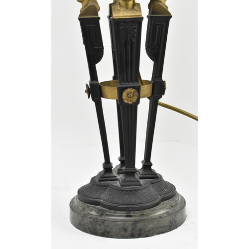 390 - A 20th century cast iron, porcelain and slate Neo Classical style column table lamp. The lamp with m... 