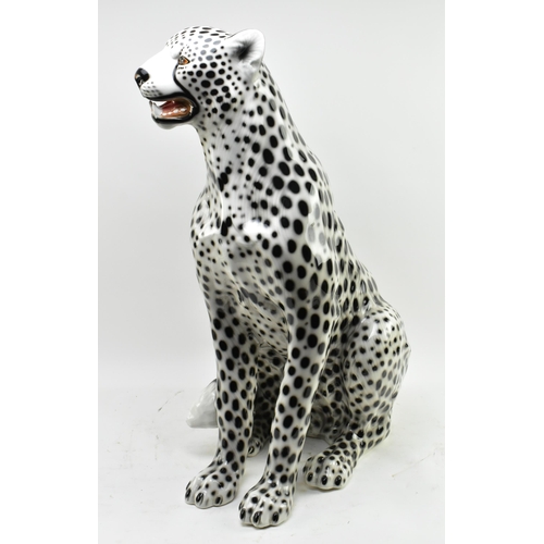 4 - A retro 20th century 1970s Italian large ceramic Snow Leopard figure / statue. The leopard seated wi... 