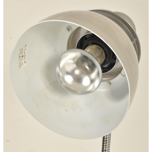 401 - Bell ID - a 20th century chrome floor standing lamp light. The lamp having an aluminium shade suppor... 