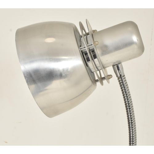 401 - Bell ID - a 20th century chrome floor standing lamp light. The lamp having an aluminium shade suppor... 