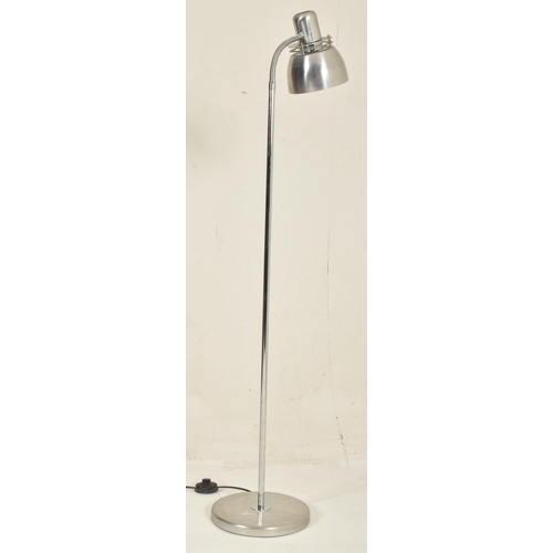 401 - Bell ID - a 20th century chrome floor standing lamp light. The lamp having an aluminium shade suppor... 