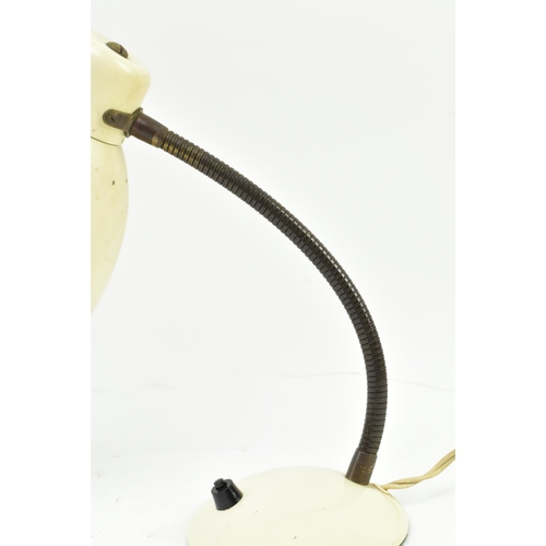 405 - A vintage mid century circa 1970s cream enamel gooseneck articulated desk lamp. The lamp light featu... 