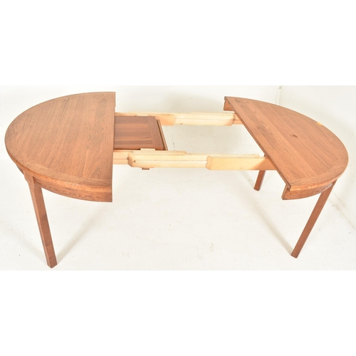 406 - Nils Jonsson, Sweden - a retro mid 20th century Swedish teak wood circular extending dining table. T... 