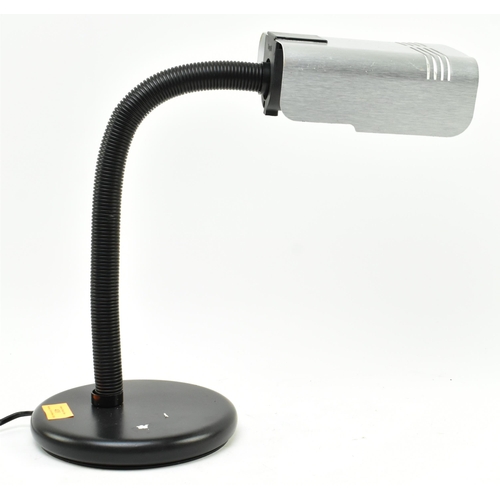 408 - Targetti - a vintage 1970s modernist Italian side desk lamp. The lamp with curved steel shade over p... 