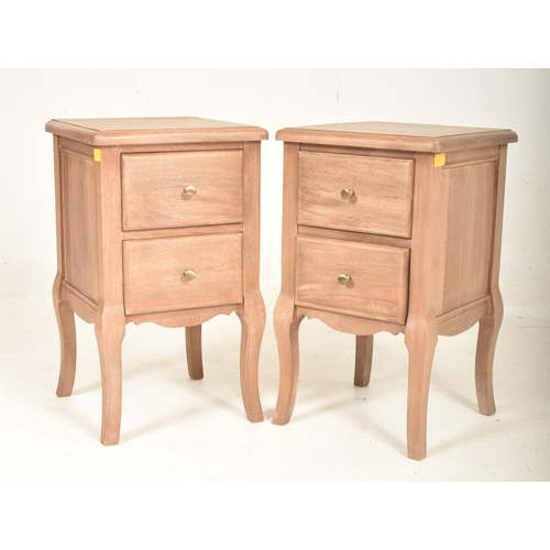 409 - A contemporary high end design Mango wood bedroom suite comprising of dressing table desk and pair o... 