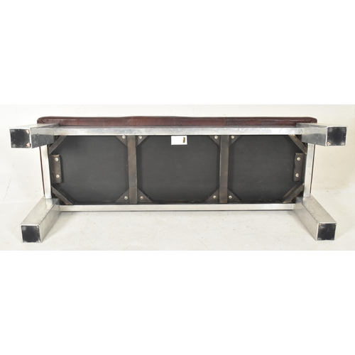 414 - A large contemporary British Design aviation style leather & chrome stool seat. The bench having... 