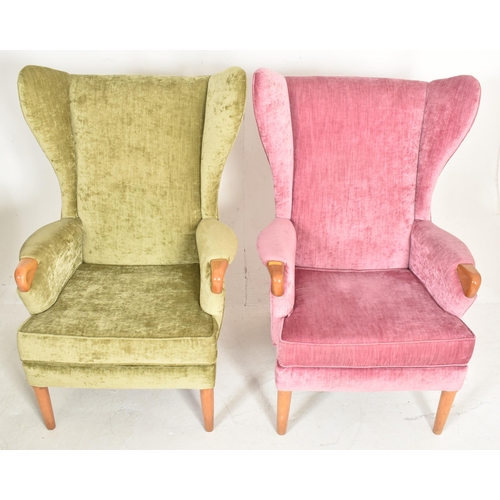 425 - Parker Knoll - Model 757 - a pair of retro 1960s wingback armchairs. Each chair having tall wingback... 