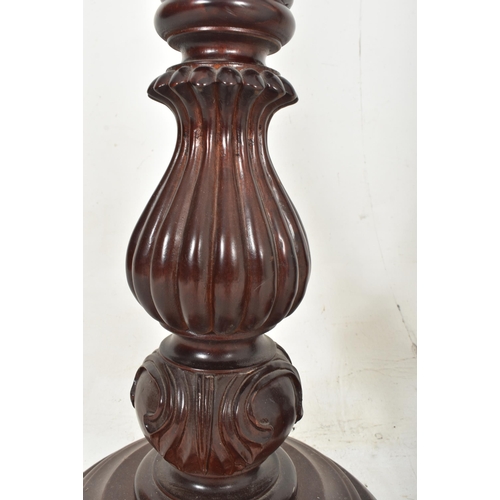 438 - A collection of five contemporary high end design carved wood floor torchere column stands of variou... 