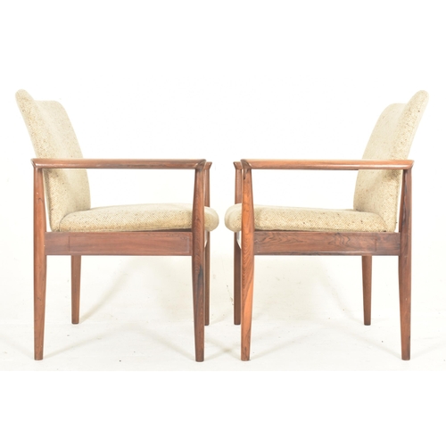 45 - Finn Juhl for France & Son - Diplomat chair - a pair of mid 20th century Danish designer teak armcha... 