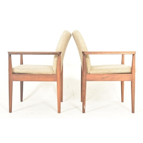 45 - Finn Juhl for France & Son - Diplomat chair - a pair of mid 20th century Danish designer teak armcha... 