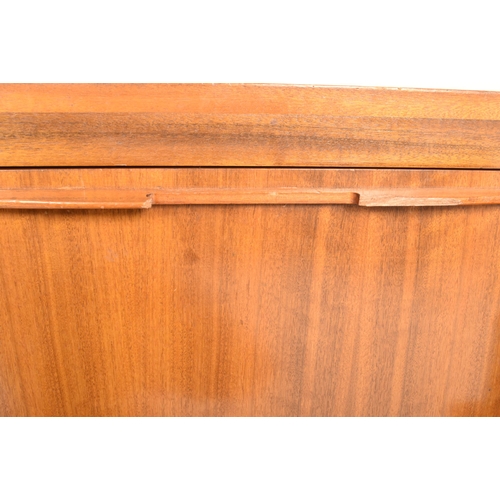 455 - Morris Of Glasgow (believed) - a retro mid 20th century walnut sideboard credenza. The sideboard hav... 