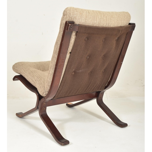 458 - A Scandinavian retro 20th century stained bentwood & fabric upholstered easy lounge chair. The a... 