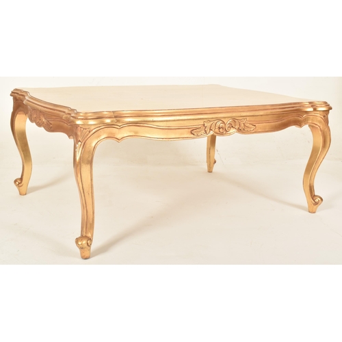 474 - A Contemporary high end design gilt painted wood low occasional coffee table in a French Empire styl... 