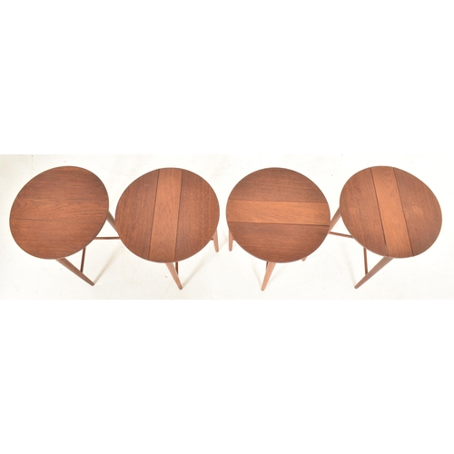 477 - Poul Hundevad, Denmark - A retro mid 20th century circa 1960s Danish drop leaf teak veneered quartet... 